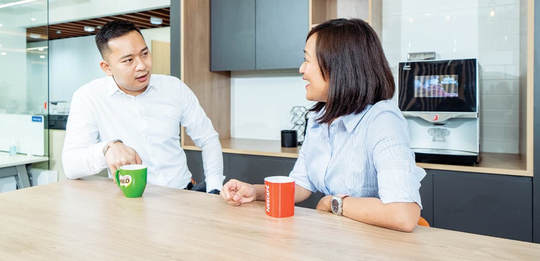 man and woman having conversation