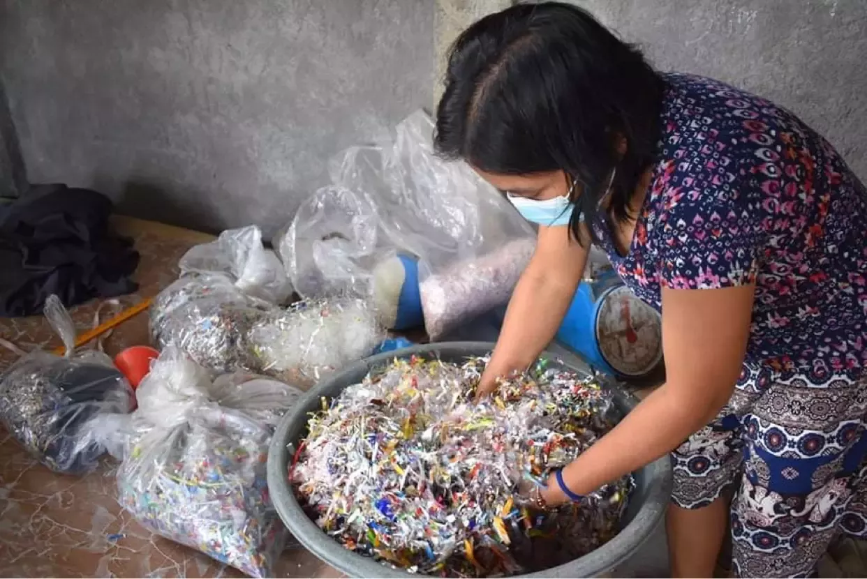 KALIPI member preparing the used plastics
